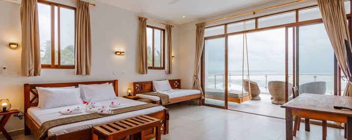 Strandvilla – Sun Suite med adgang til pool / direkte havudsigt